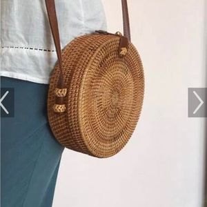 Woven wicker rattan circle bag. 7.5 x 3 inches.